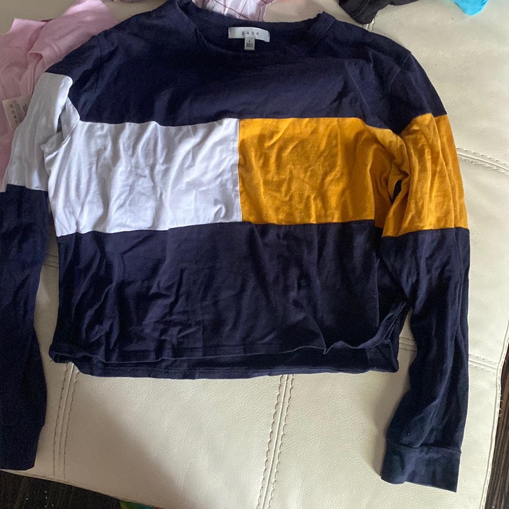 Navy blue shirt with white and yellow sections